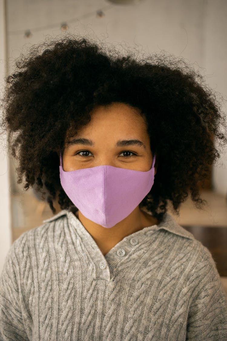 Cheerful Black Woman In Face Mask