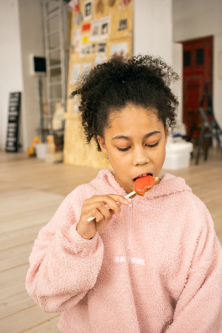 Black Girl Eating Gingerbread Cookie