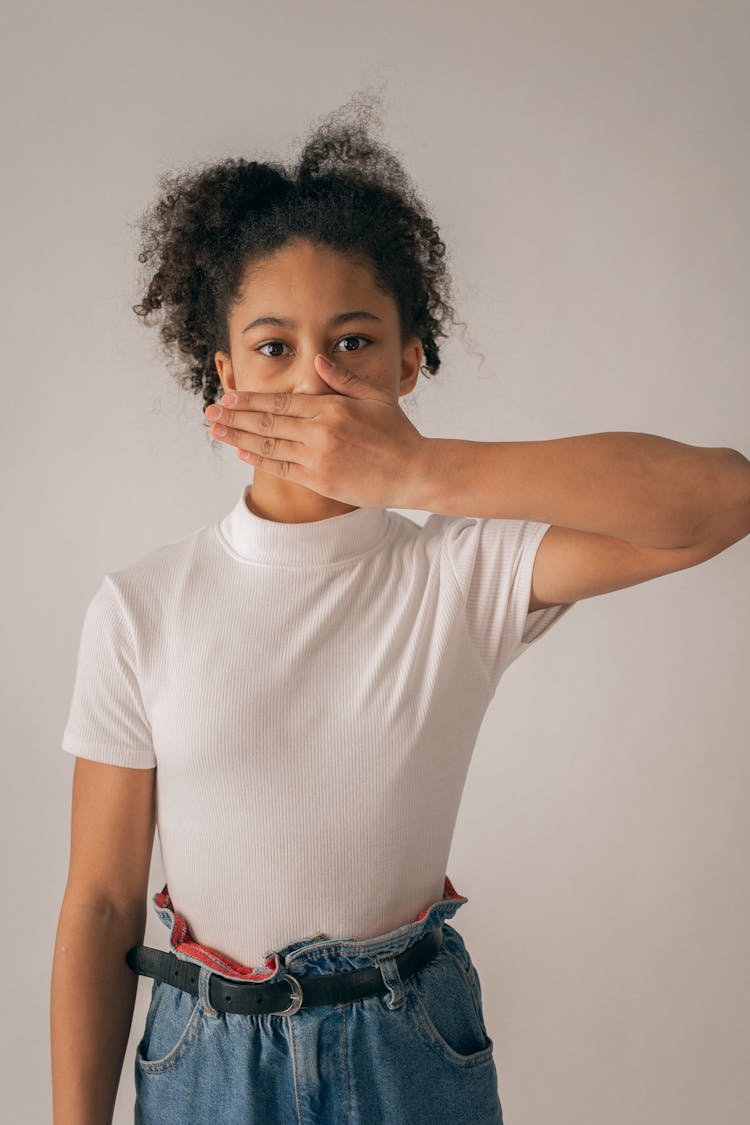 Worried Black Girl Covering Mouth