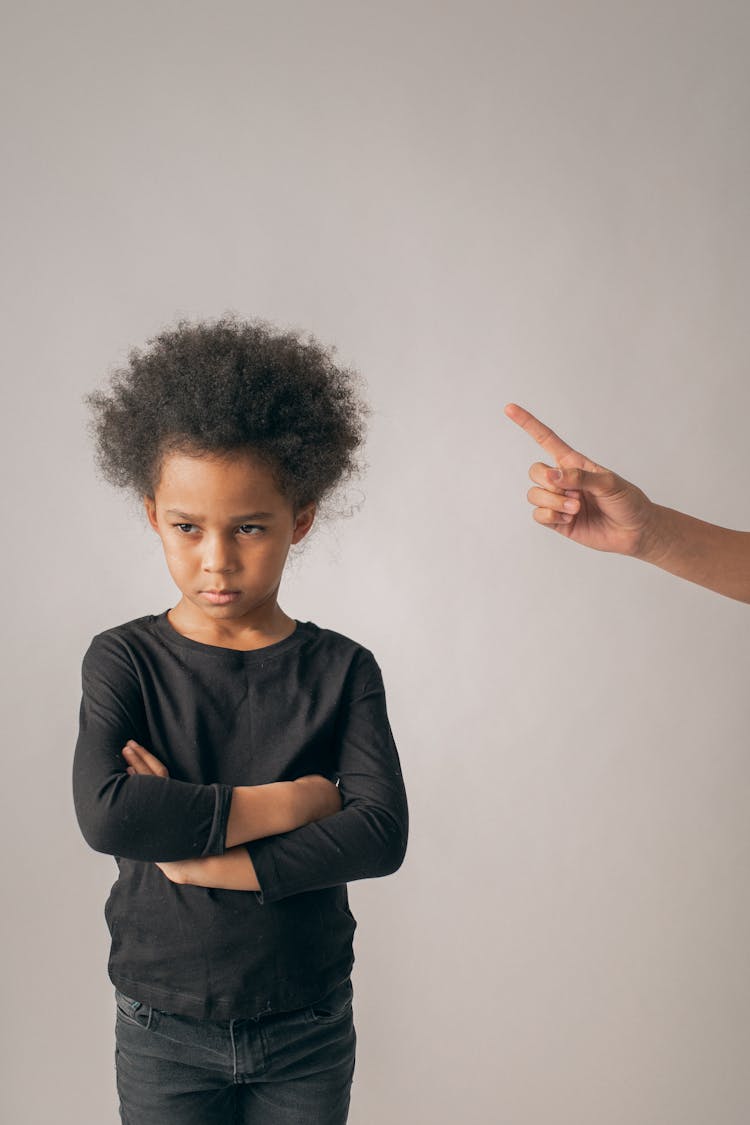 Unrecognizable Person Scolding Black Girl