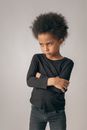 Upset black girl in studio