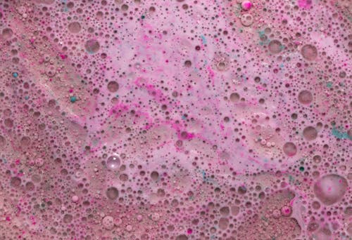 Close-up Photo of Pink Water Bubbles