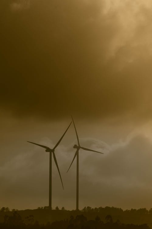 Free Wind Turbines Under the Clouds Stock Photo