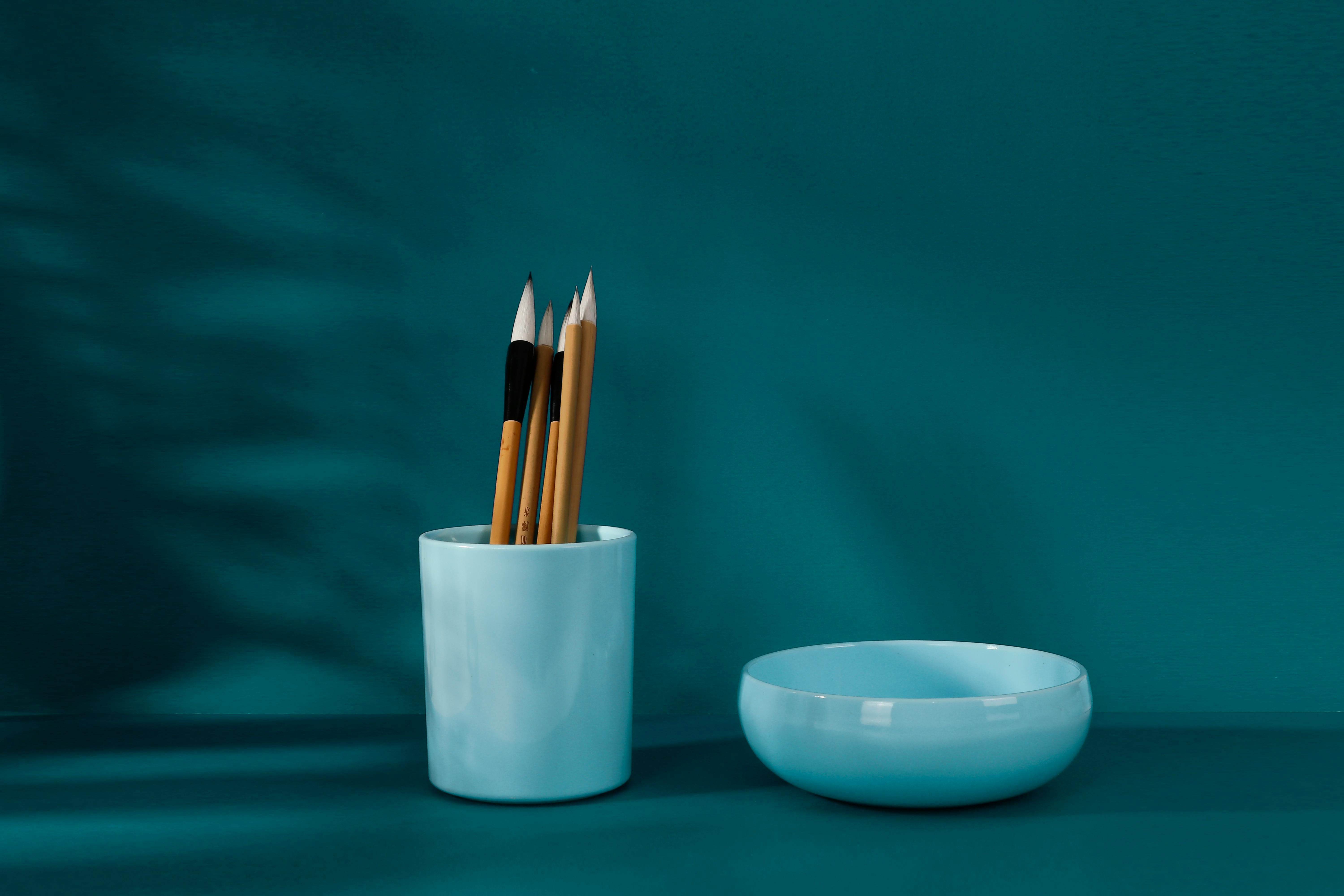 Light Blue Ceramic Bowl and Pencil Holder with Pencils · Free Stock Photo