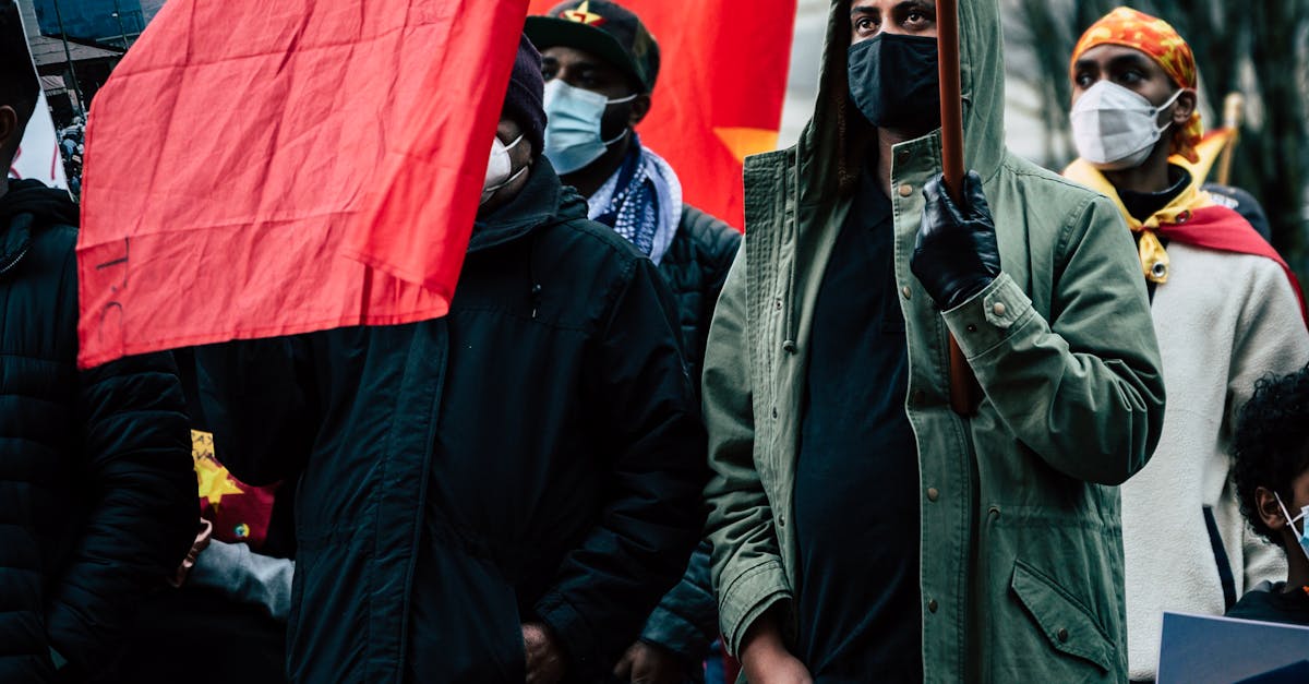 Crowd of anonymous black demonstrators protesting against war on city ...