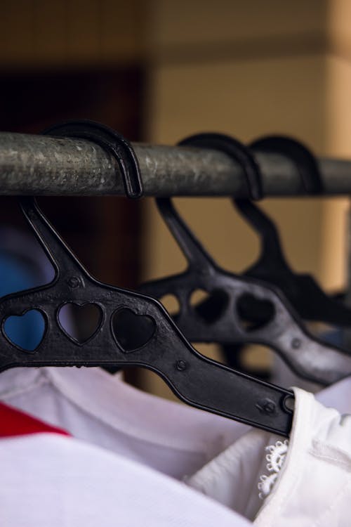Free Hangers with clothes on rack Stock Photo
