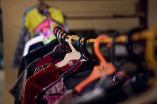 Collection of clothes on rack