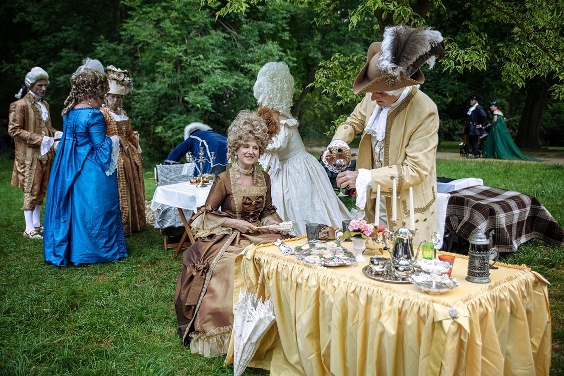 Rococco Tea Party People in a Rococo Attire gathering on a Garden ยท Free Stock Photo
