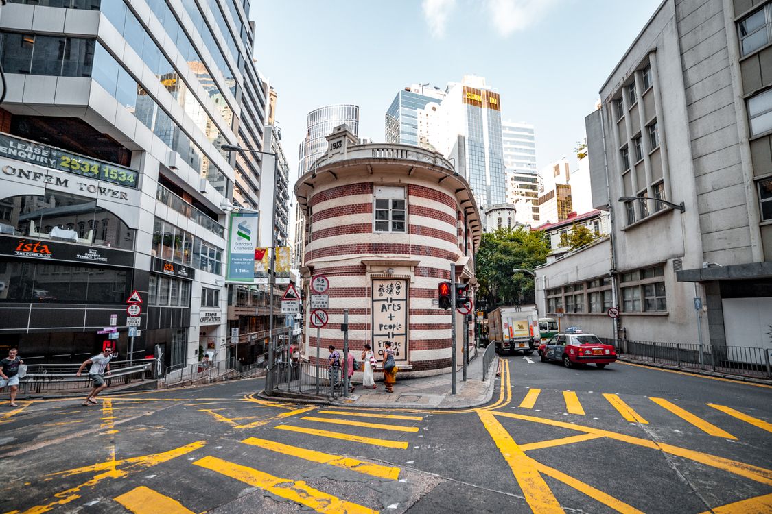 Building at a Zebra Crossing on a Road Intersection · Free Stock Photo
