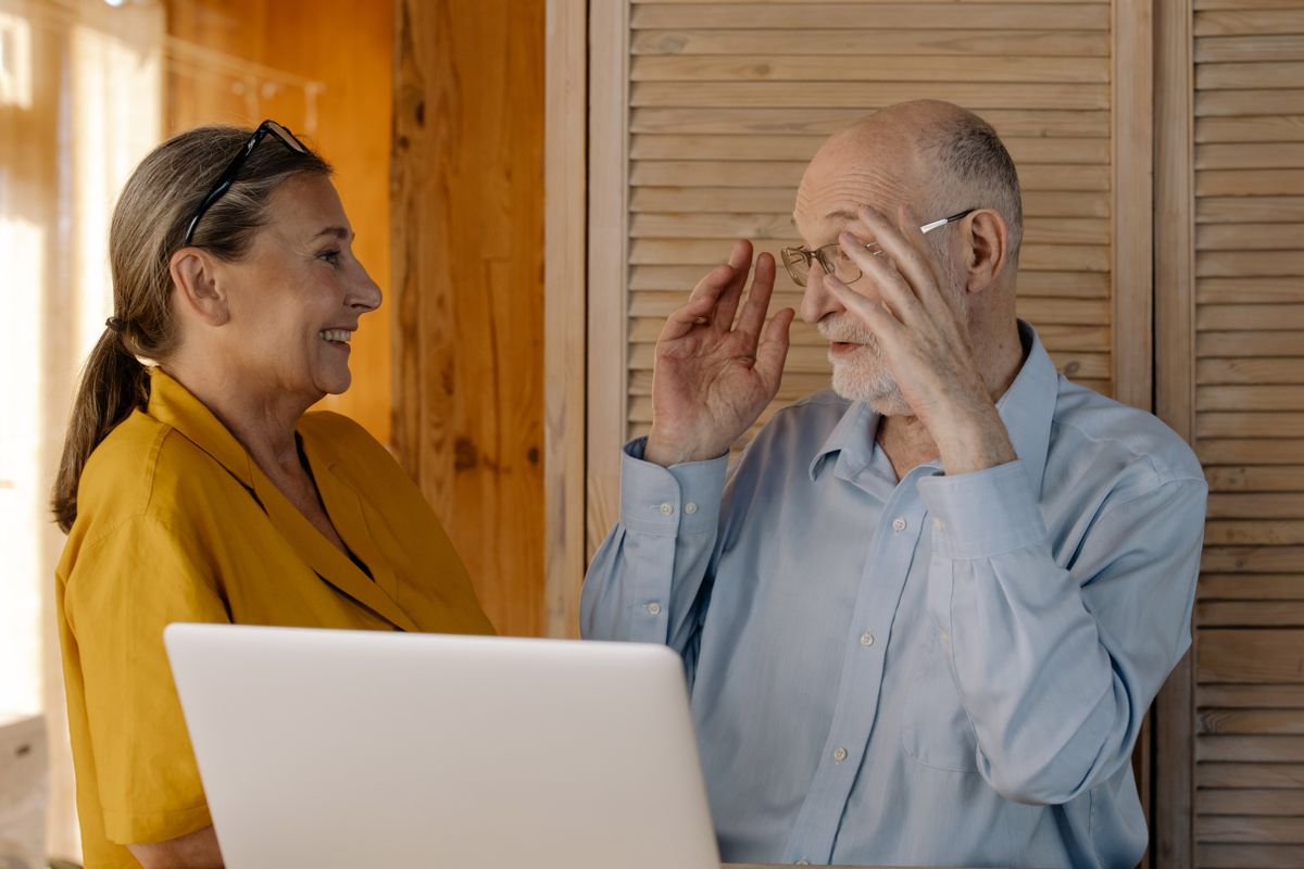Senior couple reviewing retirement finances together