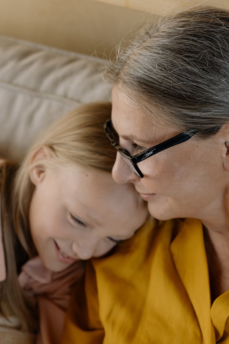 An Elderly Woman With Her Granddaughter 