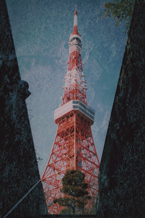 Red and White Tower Under Blue Sky