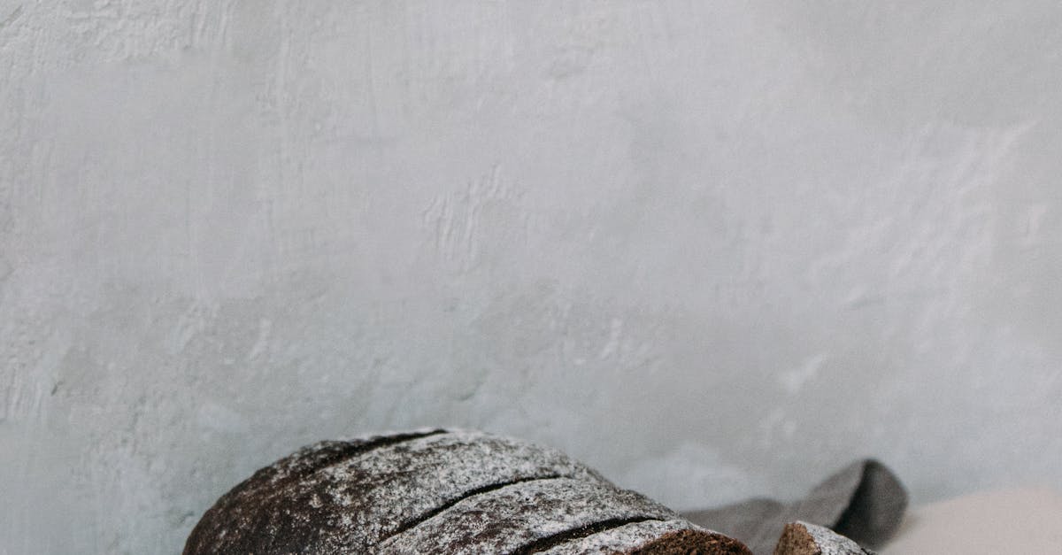 Bread and Eggs on Table Napkin on Chopping Board