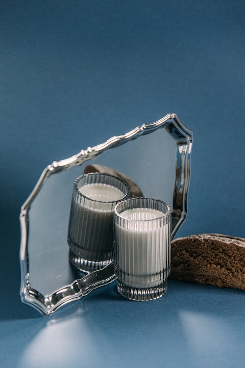 Free A Glass of Milk Beside a Silver Tray Stock Photo