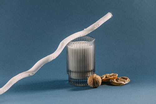 Free Straw on a Glass of Milk Stock Photo