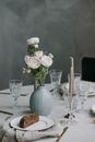 White Roses in Clear Glass Vase