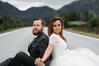 Man in Black Suit Jacket Hugging Woman in White Wedding Dress
