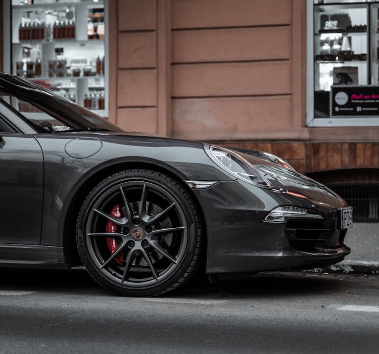 Photo Of A Sports Car With A Black Rim