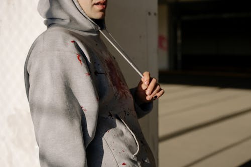 A Person Wearing a Gray Hoodie Jacket