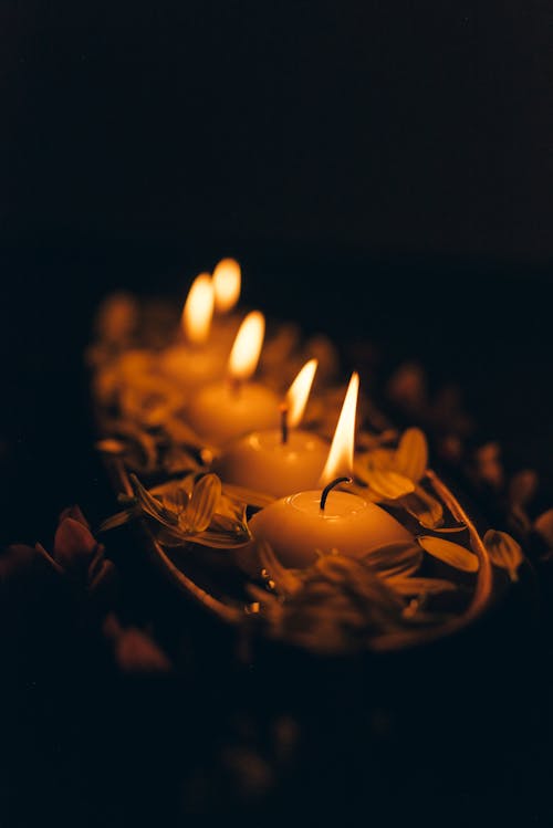 Lighted Candles in Dark Room