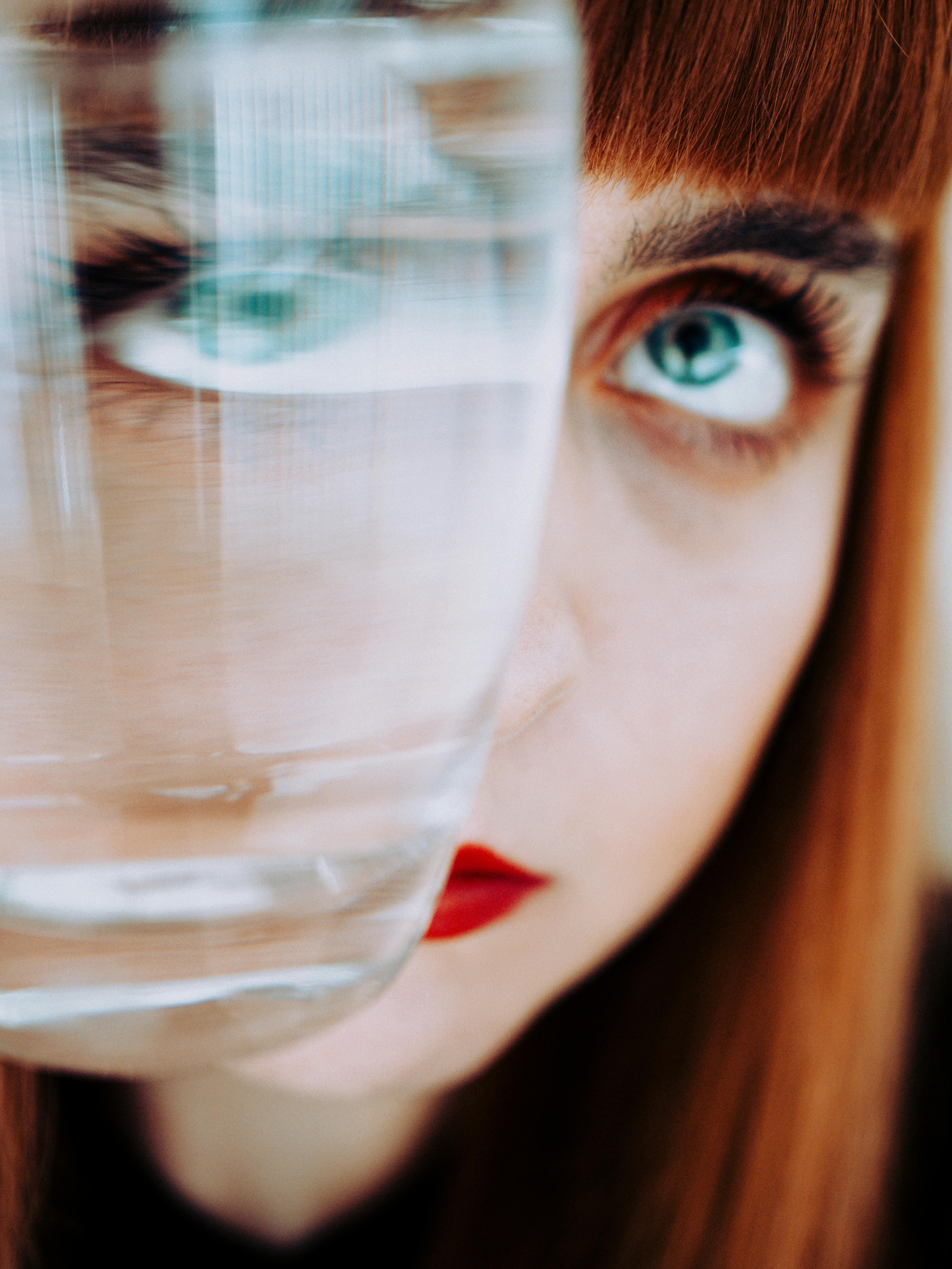 Woman Holding Clear Drinking Glass · Free Stock Photo