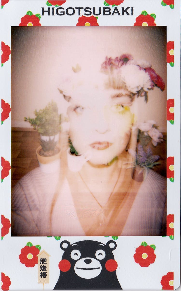 Overexposed Portrait Of A Woman In A Flower Crown 