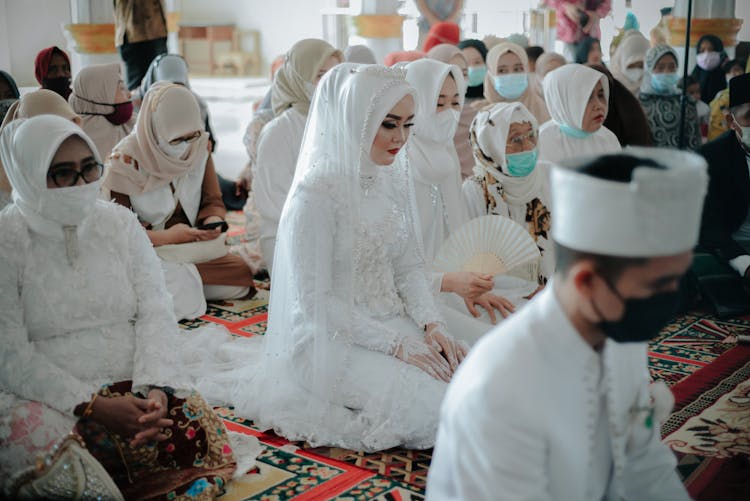 People During A Muslim Wedding Ceremony