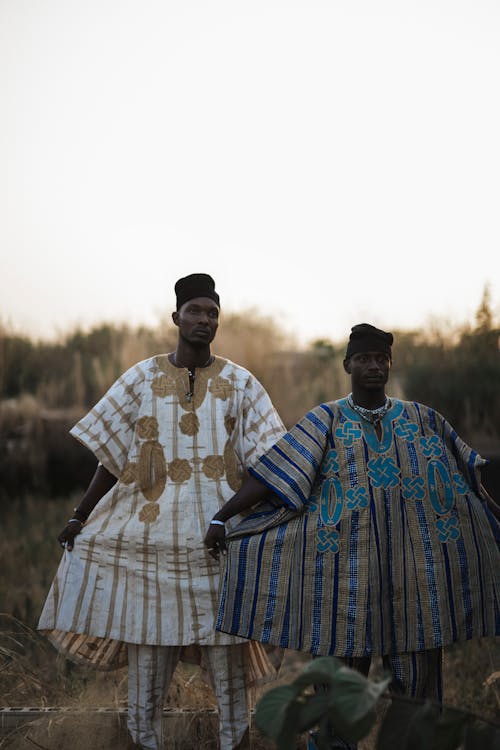 Two Men Wearing Traditional Clothes 