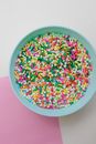 Yellow Green and Pink Candies in White Ceramic Bowl