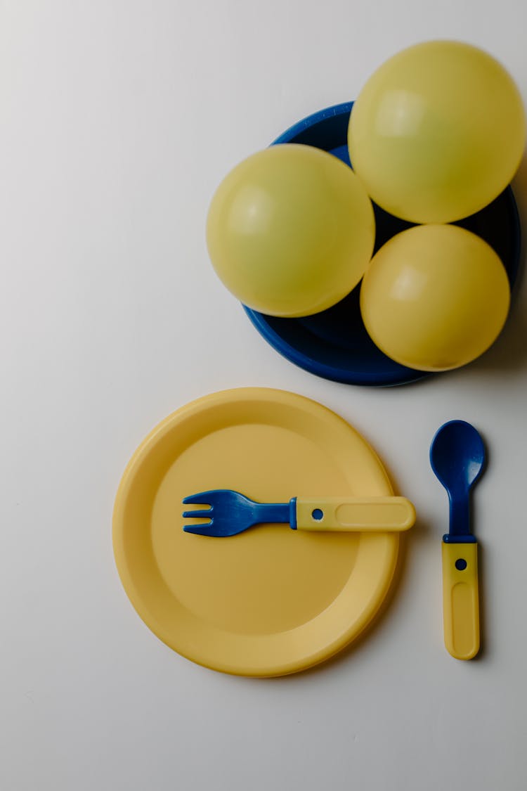 Plastic Tableware And Balloons