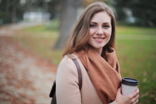 Free Woman Holding Disposable Cup Stock Photo
