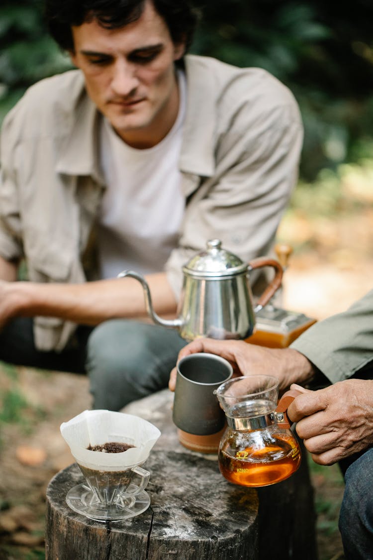 Crop Friends With Aromatic Coffee In Garden