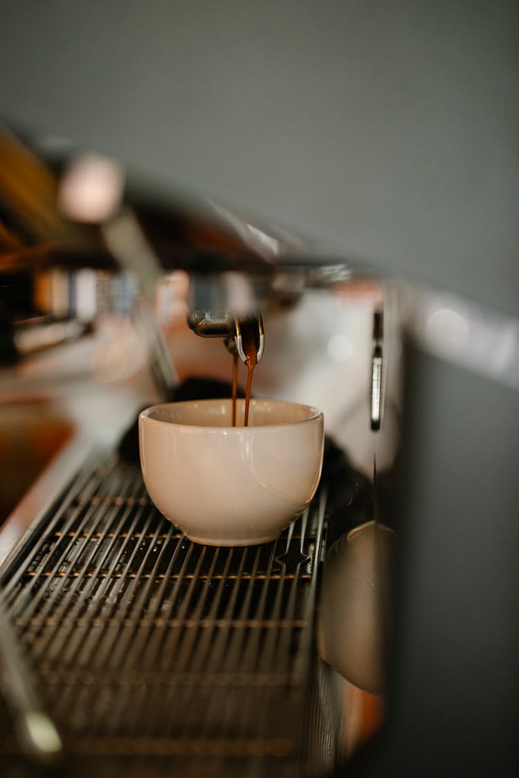 Process Of Preparation Of Espresso With Modern Coffee Machine