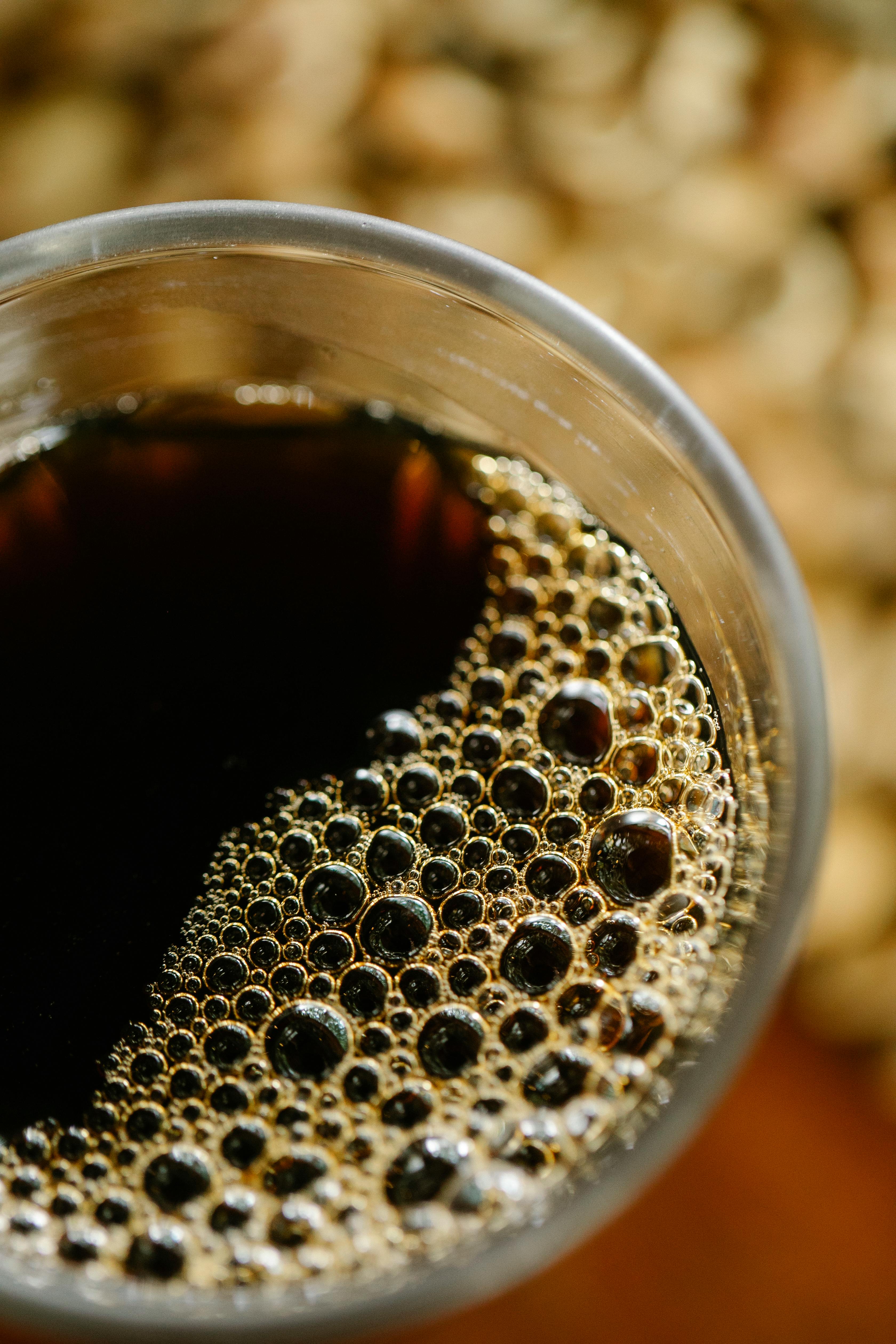 coffee cup placed on wooden surface