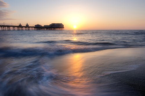 Free stock photo of beautiful sunset, by the sea, england Stock Photo