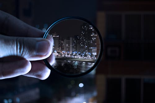 Free Person Holding Magnifying Glass Stock Photo