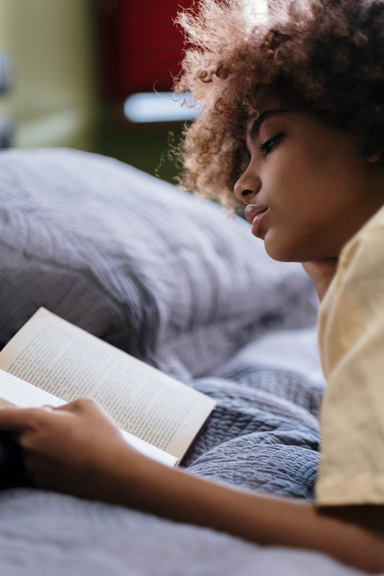 A Woman Reading A Book