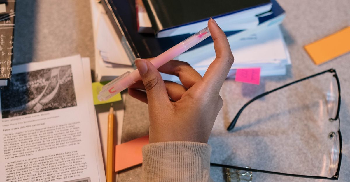 Pen Homework Playing with a pen while studying · Free Stock Photo