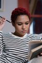 Woman in Black and White Striped Crew Neck Shirt