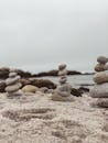 Stack of Stones on Brown Sand