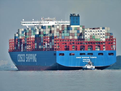 Blue Cargo Ship on the Sea