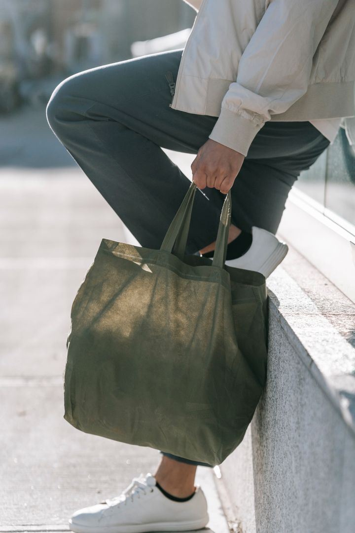 Canvas shopper carried by hand, photo by Michael Burrows on Pexels