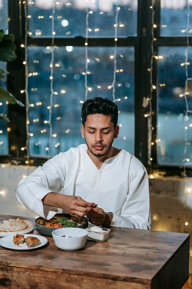 Man Eating Dinner