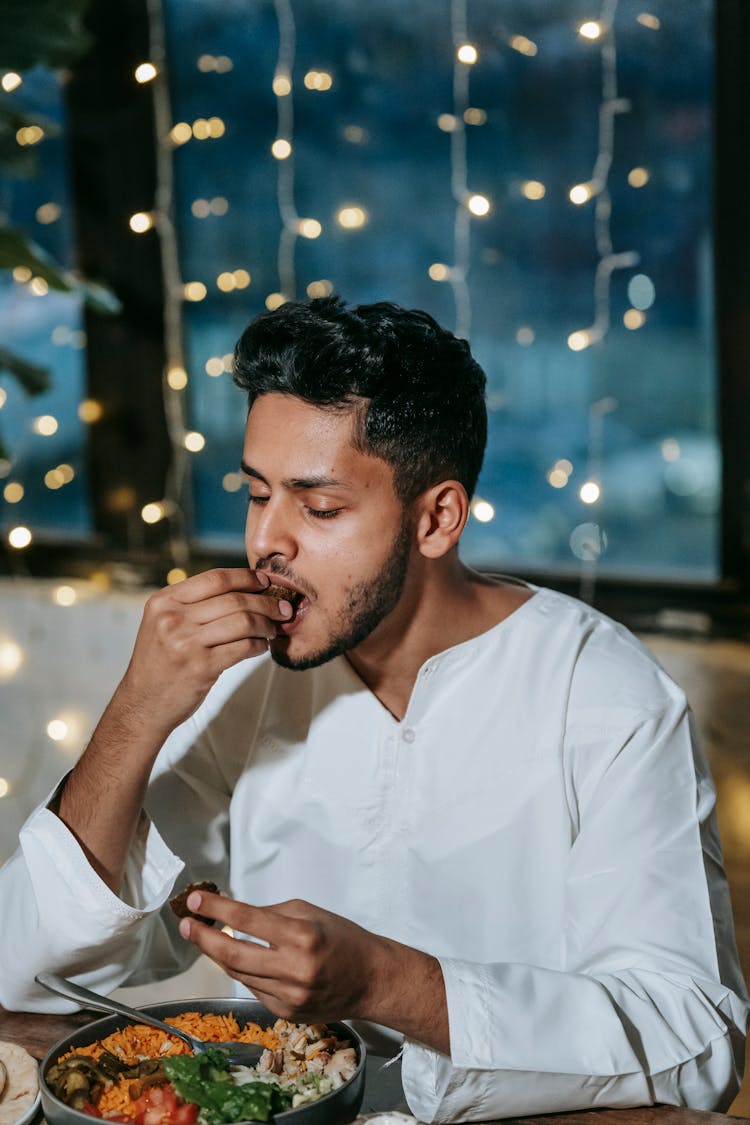 Man Eating Dinner