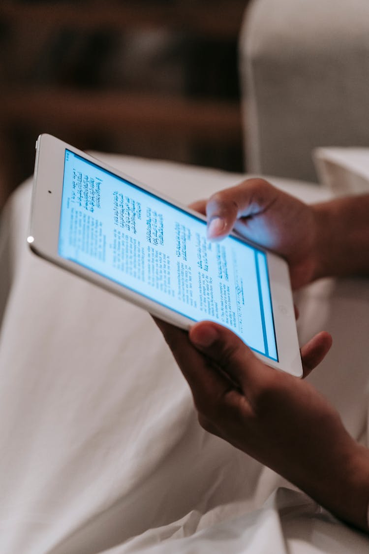 Person Holding White Ipad Mini