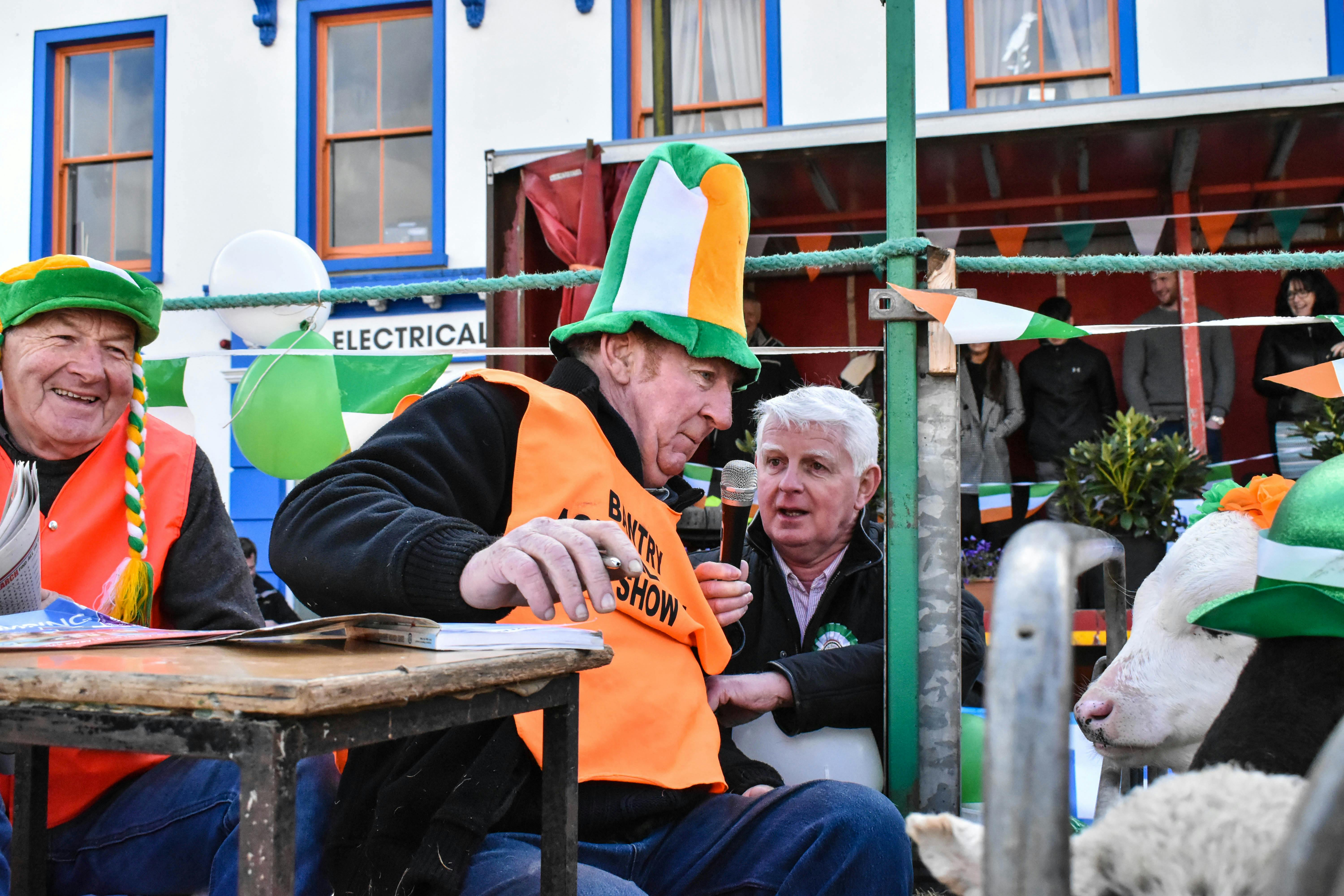 Hands opening to sunrise over water symbolizing manifestation and new beginnings