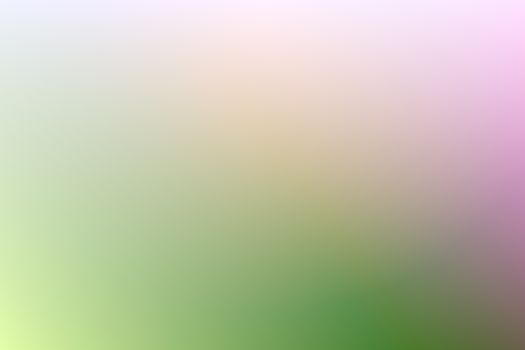 A soothing gradient blend of green and purple hues in abstract art form.