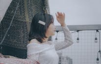 A Beautiful Woman in White Off Shoulder Top