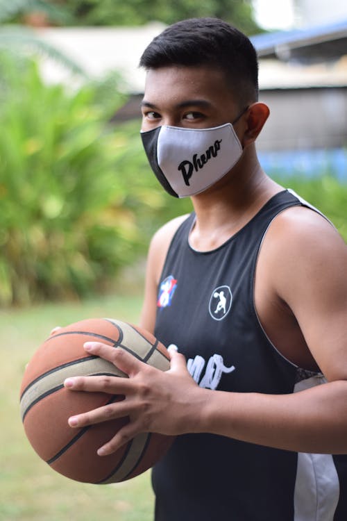 An Athlete Wearing a Face Mask · Free Stock Photo