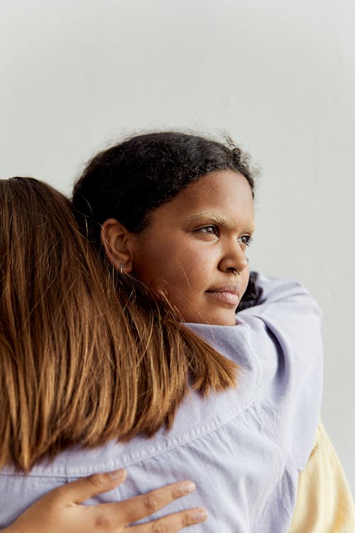 Free A Couple Hugging Each Other Stock Photo